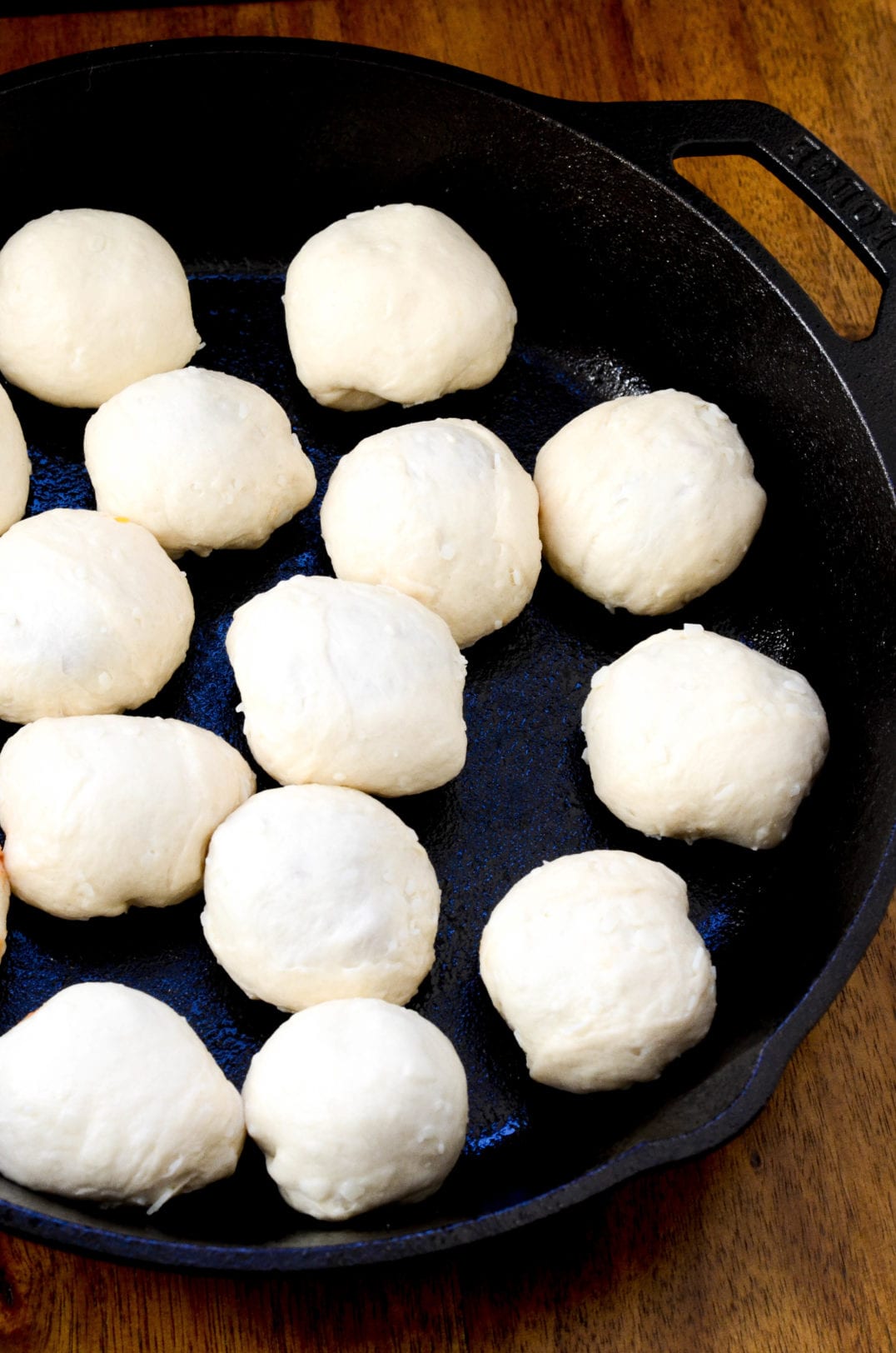 uncooked pork bombs in skillet