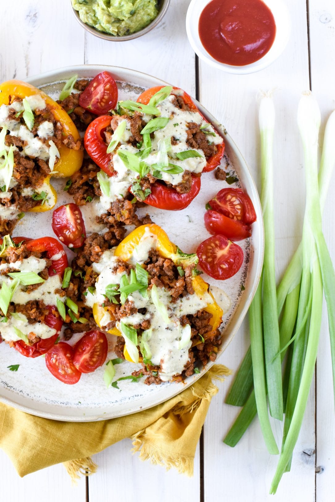 Healthy Whole30 Stuffed Peppers with Avocado Cashew Sauce