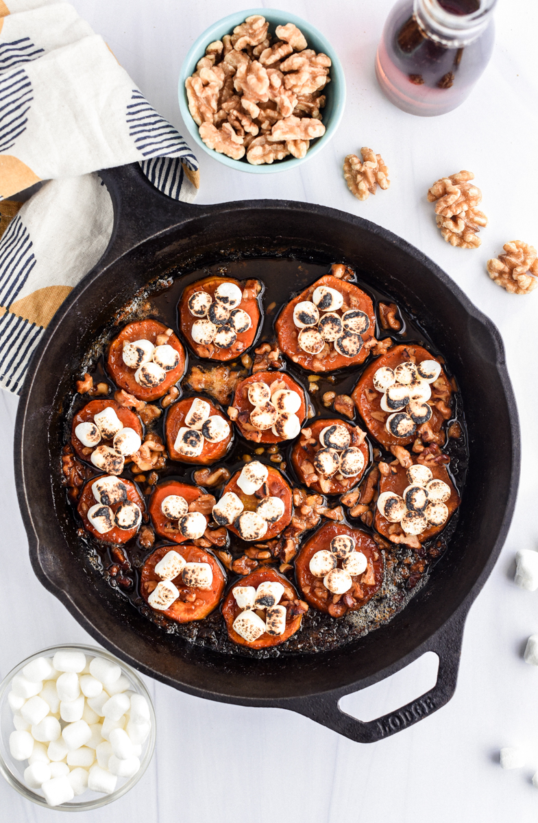 melting sweet potatoes with marshmallows and walnuts