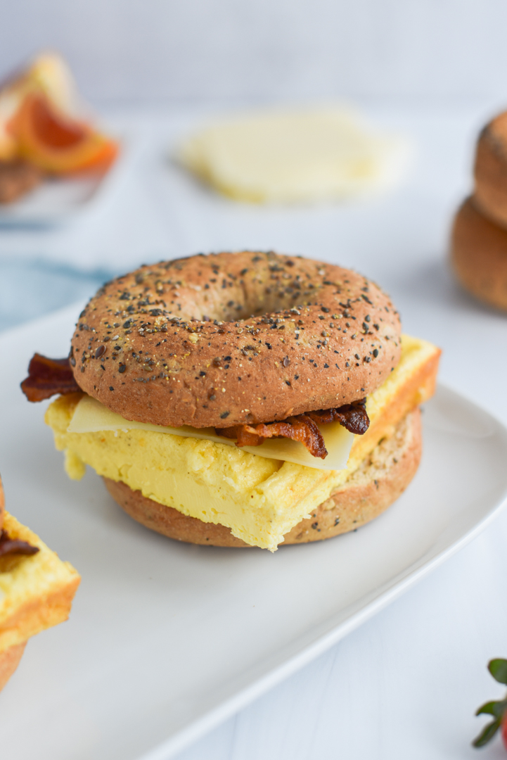 sheet pan egg on a bagel with bacon and cheese